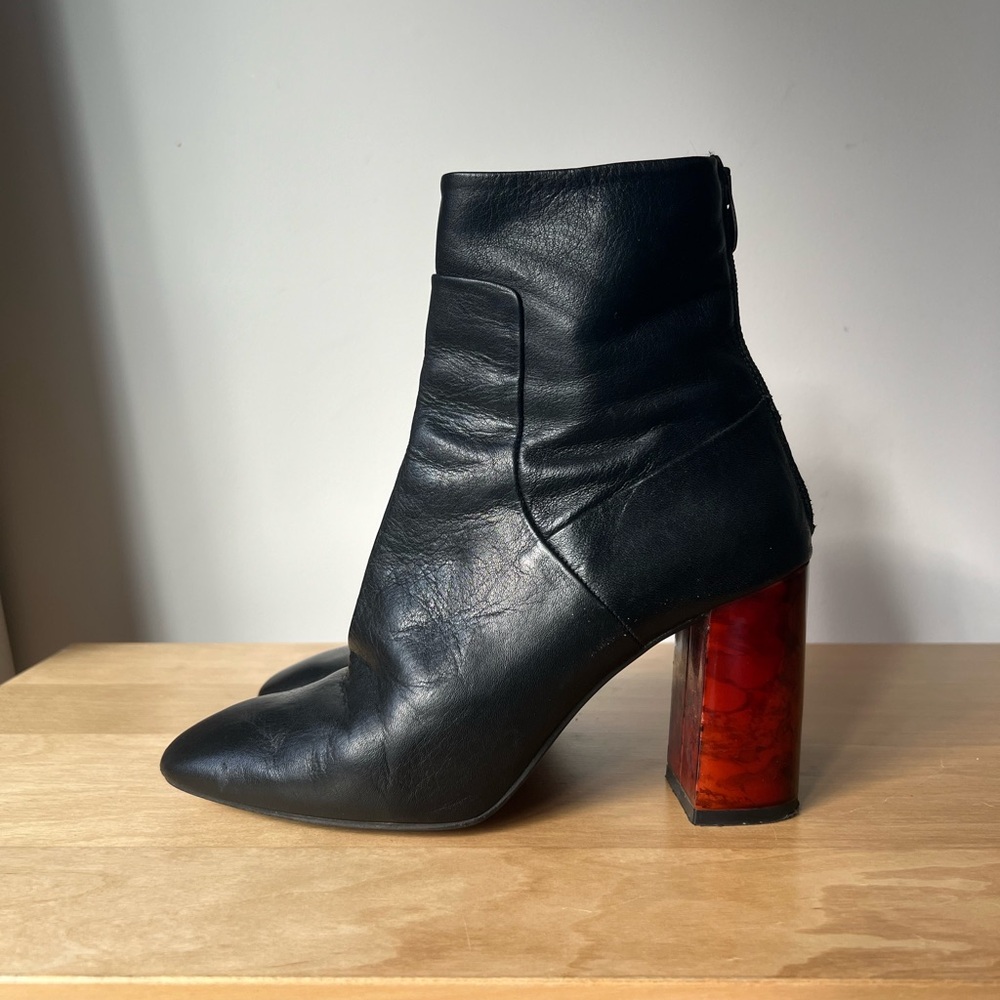 Topshop leather boots with red heel
Zipper close